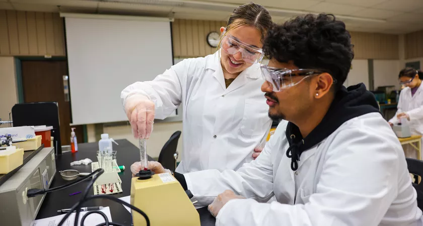 University Sciences students experimenting in the lab.