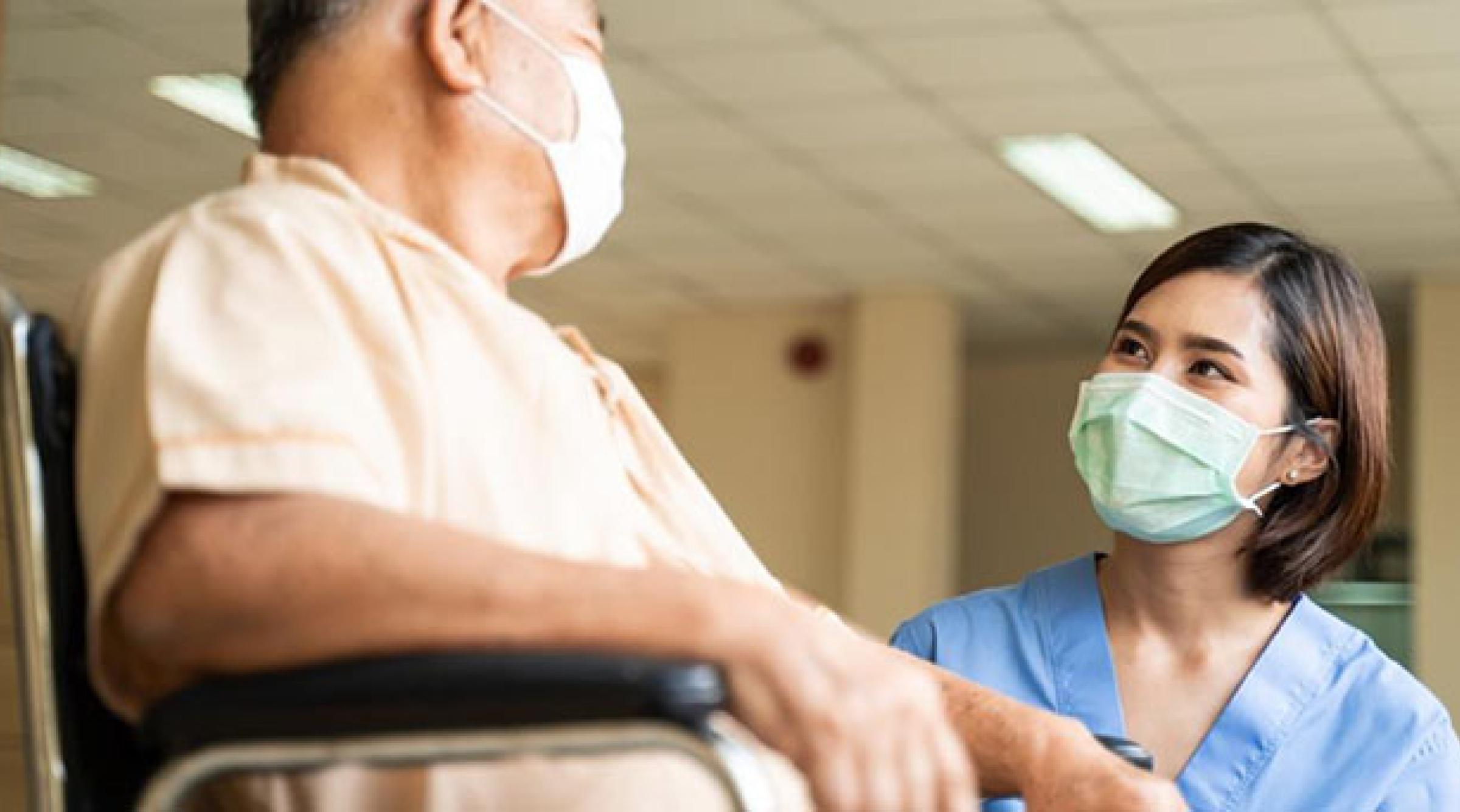 Nurse helping out patient