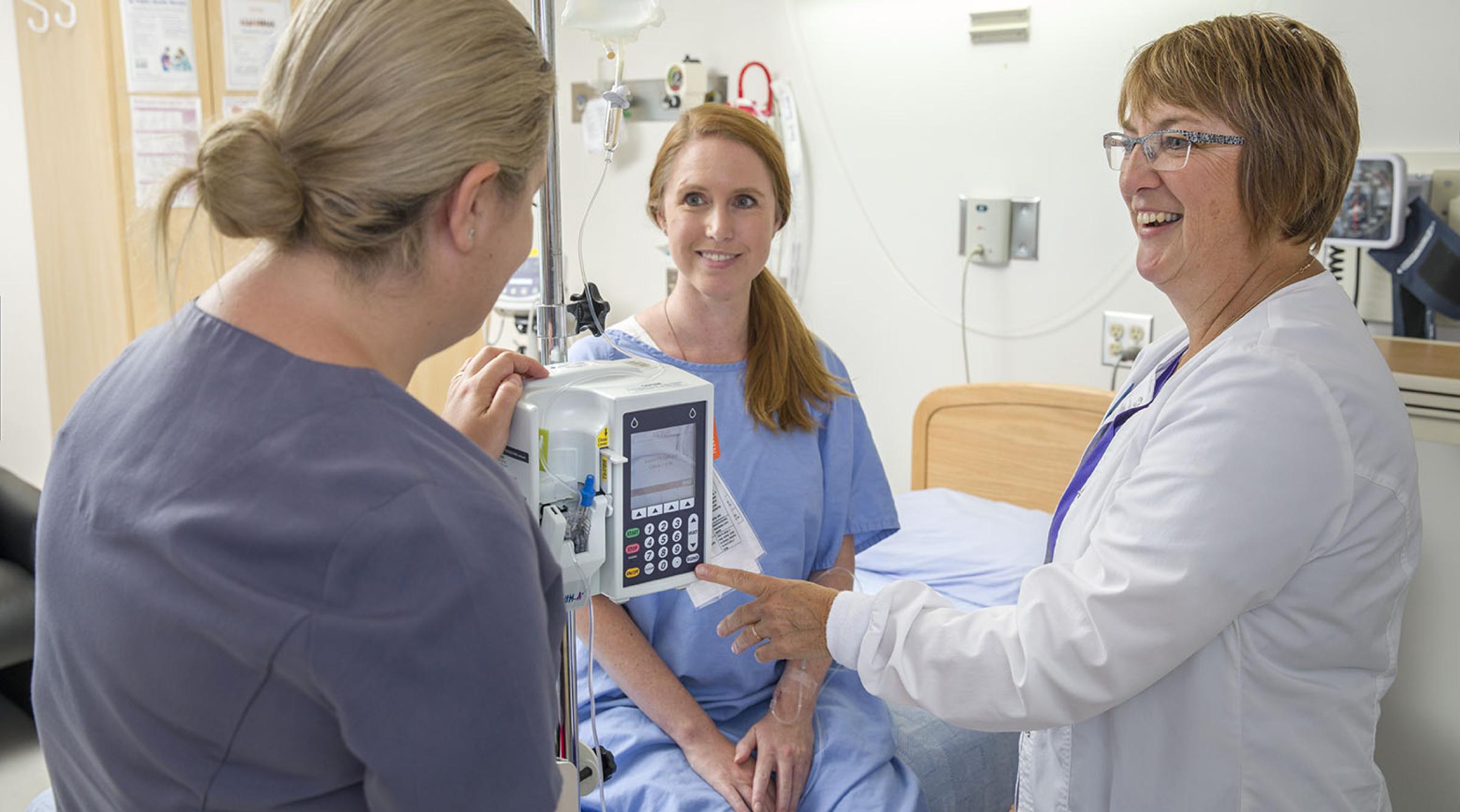 Nursing student collaborating with instructor