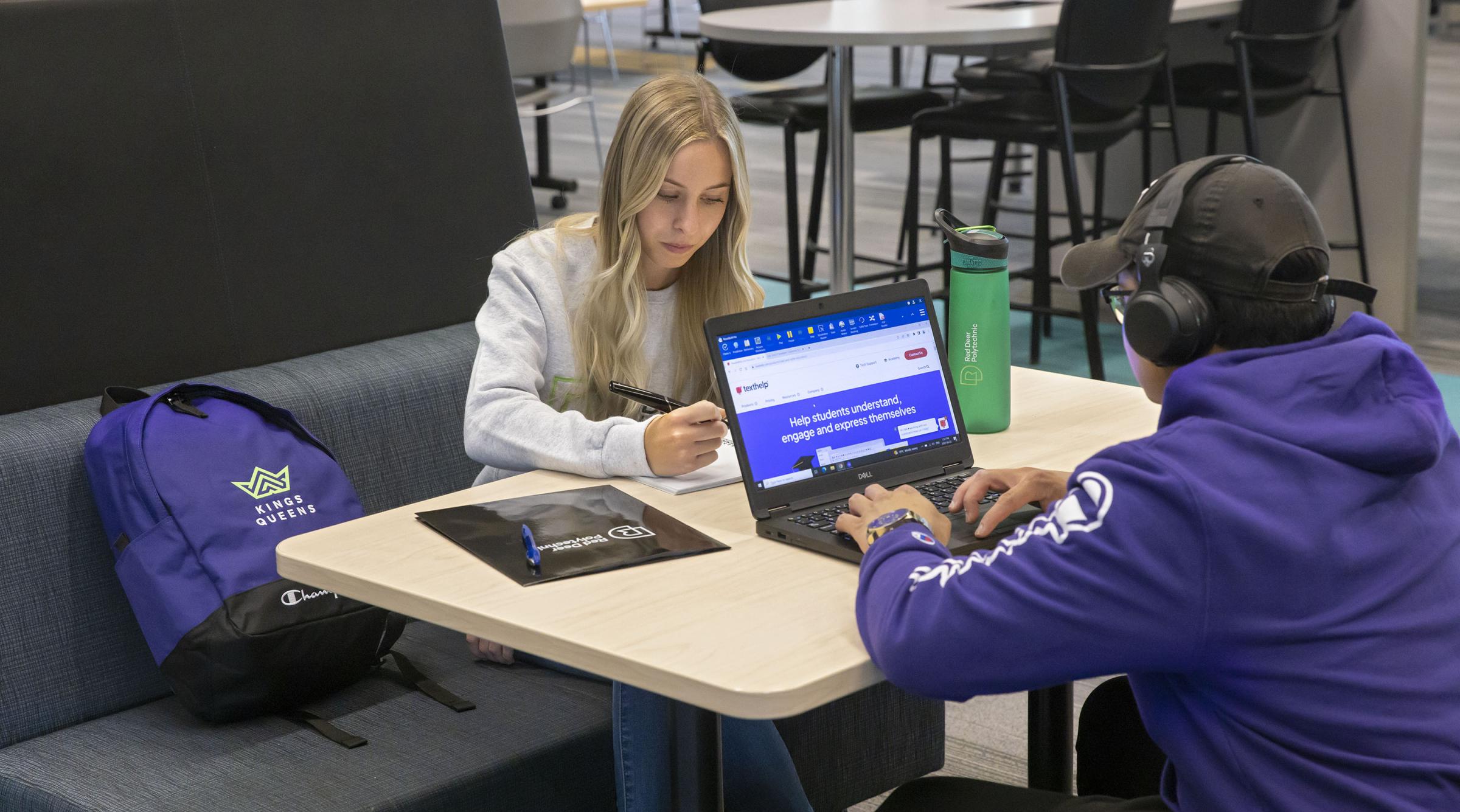 two RDP students studying in Library