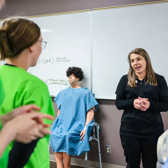 Health Care Aide students with instructor