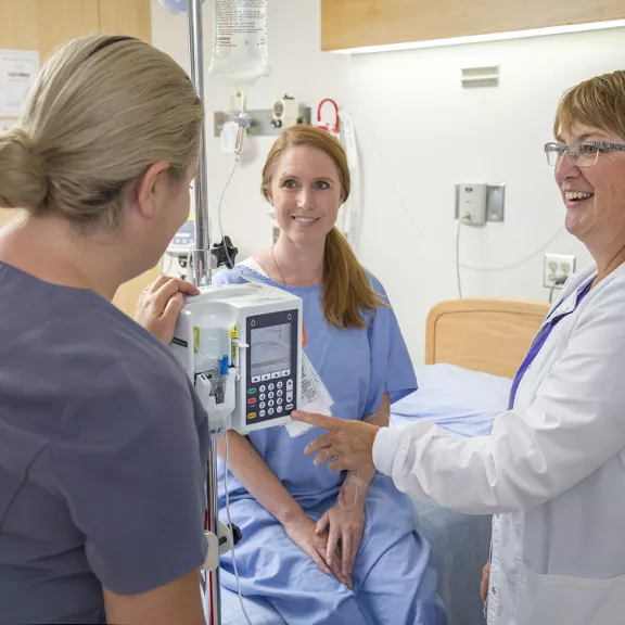 Nursing student collaborating with instructor