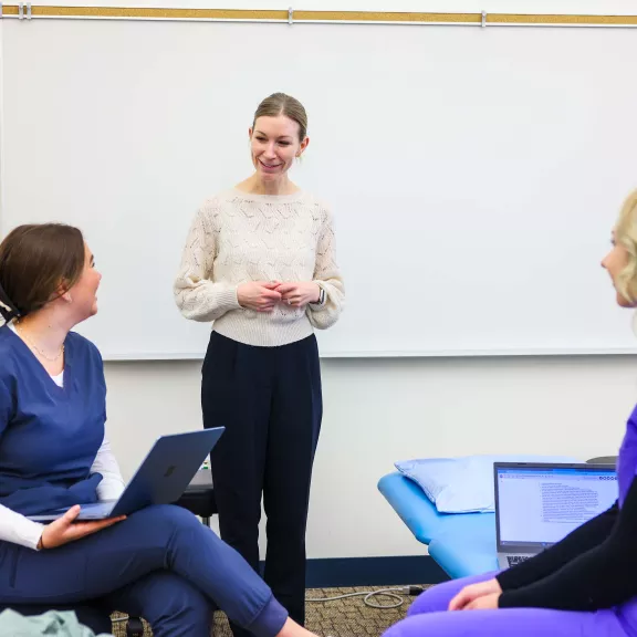 OPTA instructor with two students