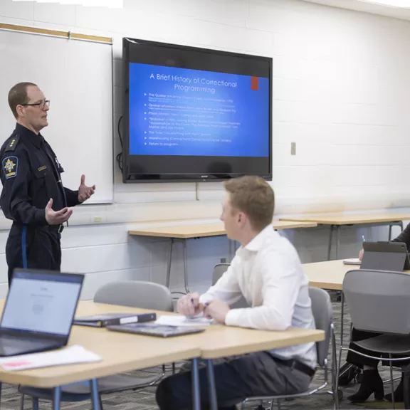 Guest speaker from Red Deer Remand presenting to class