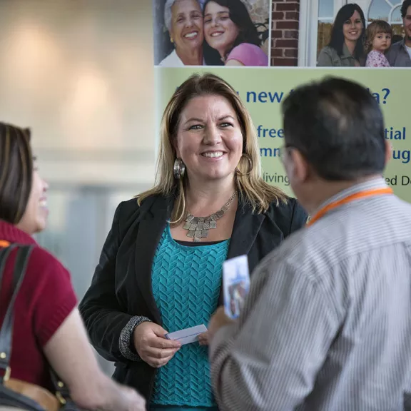 people talking at conference