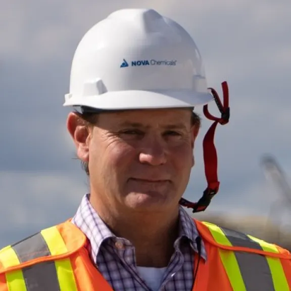 Rob Thompson wearing a NOVA Chemicals hard hat and high-visibility vest